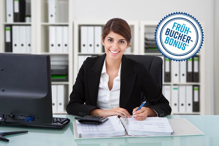Portrait,Of,Confident,Female,Accountant,Writing,On,Documents,At,Desk